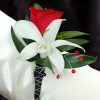 Red Sweetheart Rose and White Orchid Boutonniere - Black